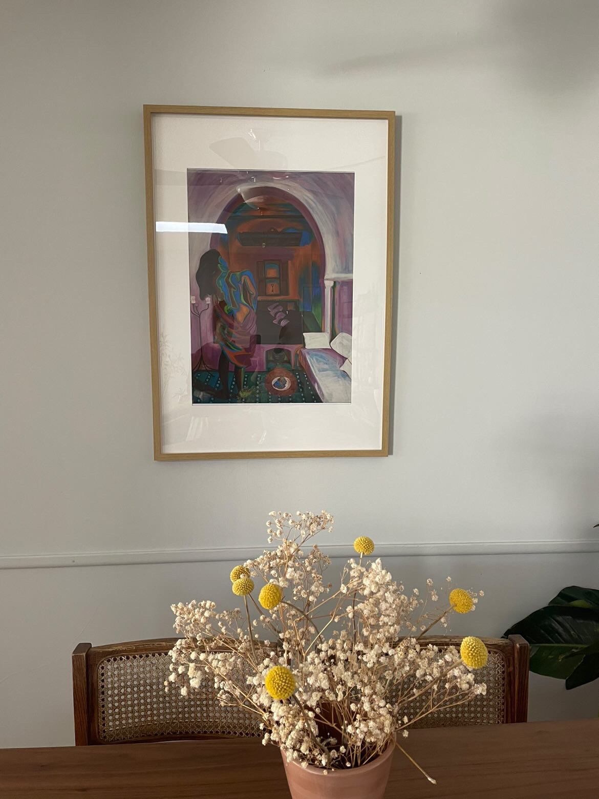 Feminine Solitude above a dining table